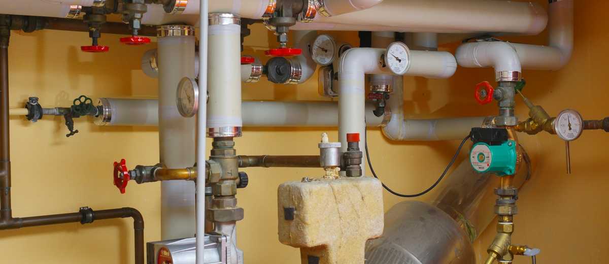 Pipes, pumps and valves in a boiler room